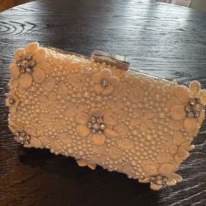Olga Berg Cream Clutch with Textured Finish